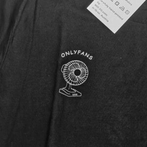 Black "Onlyfans" shirt close up