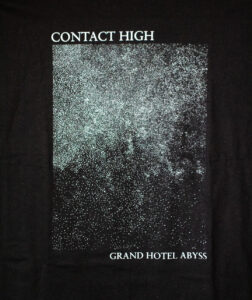 A black shirt with a white print of the album cover art. It reads "Contact High" and "Grand Budapest Hotel" in between those texts is an abstract gradient of points. It is cropped to only show the artwork.