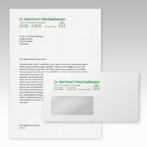 A mockup letter and envelope with the one-lined version of the green logo.